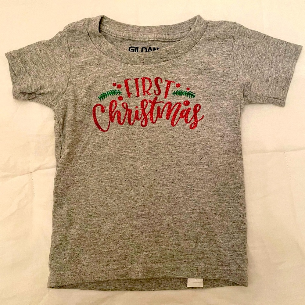 First Christmas tee shirt size says 2T but runs VERY small (fits like 9 months)